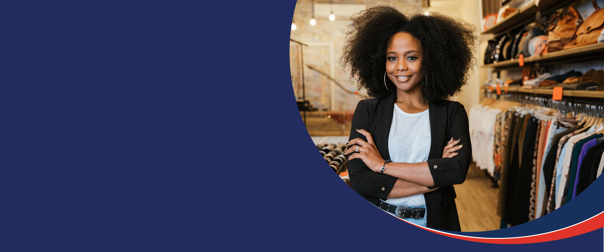 Professional woman standing with her arms crossed smiling
